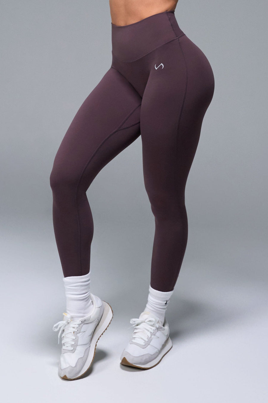 Front View of Brown TLF NeoCloud™ Secret Glute Seam Leggings featuring our new secret glute seam technology to lift and shape your glutes. 