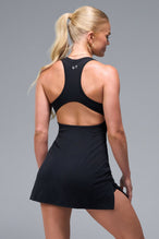 Back View of Black TLF NeoCloud™ Skort Dress featuring built in shorts with pockets, racerback design and built in sports bra with removable pads