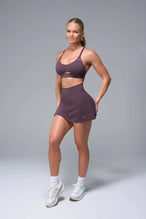 Front View of Brown TLF NeoCloud™ workout skirt featuring built in 2.5-inch inseam shorts and side pockets