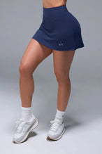 Front View of Blue TLF NeoCloud™ workout skirt featuring built in 2.5-inch inseam shorts and side pockets