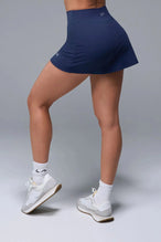 Back View of Blue TLF NeoCloud™ workout skirt featuring built in 2.5-inch inseam shorts and side pockets