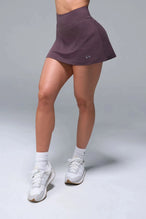 Front View of Brown TLF NeoCloud™ workout skirt featuring built in 2.5-inch inseam shorts and side pockets