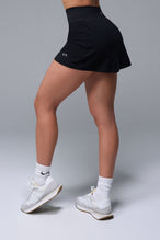 Side View of Black TLF NeoCloud™ workout skirt featuring built in 2.5-inch inseam shorts and side pockets