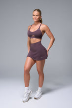 Front View of Brown TLF NeoCloud™ workout skirt featuring built in 2.5-inch inseam shorts and side pockets