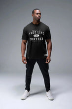 Front View of Black TLF Property of Cotton Luxe Oversized Tee featuring a distressed graphic print design across the chest in our oversized t shirt fit