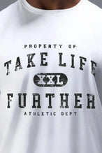 Back View of White TLF Property of Cotton Luxe Oversized Tee featuring a distressed graphic print design across the chest in our oversized t shirt fit