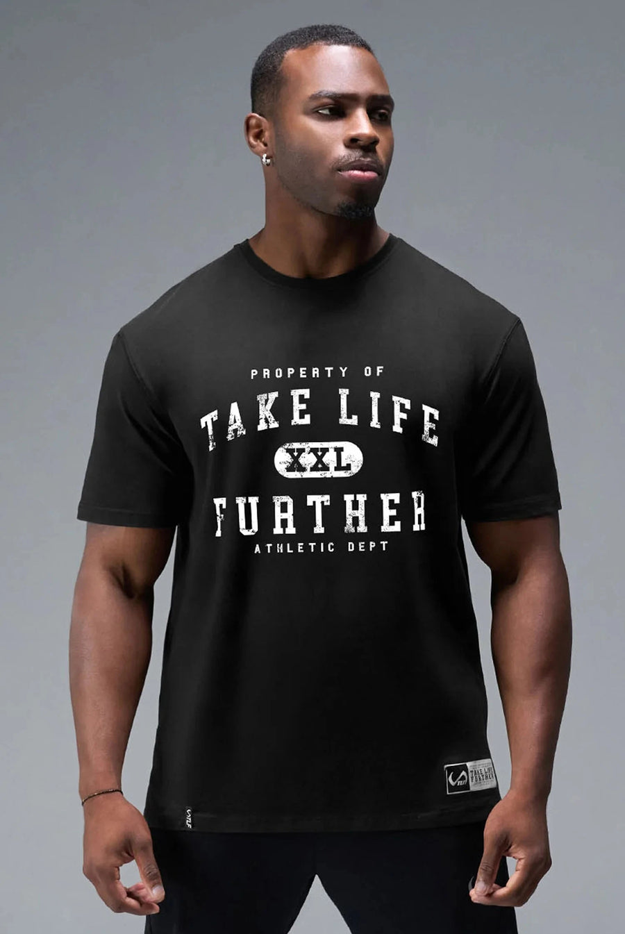 Front View of Black TLF Property of Cotton Luxe Oversized Tee featuring a distressed graphic print design across the chest in our oversized t shirt fit