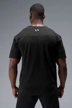 Back View of Black TLF Property of Cotton Luxe Oversized Tee featuring a distressed graphic print design across the chest in our oversized t shirt fit