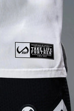 Front View of White TLF Property of Cotton Luxe Oversized Tee featuring a distressed graphic print design across the chest in our oversized t shirt fit