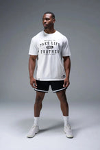 Front View of White TLF Property of Cotton Luxe Oversized Tee featuring a distressed graphic print design across the chest in our oversized t shirt fit