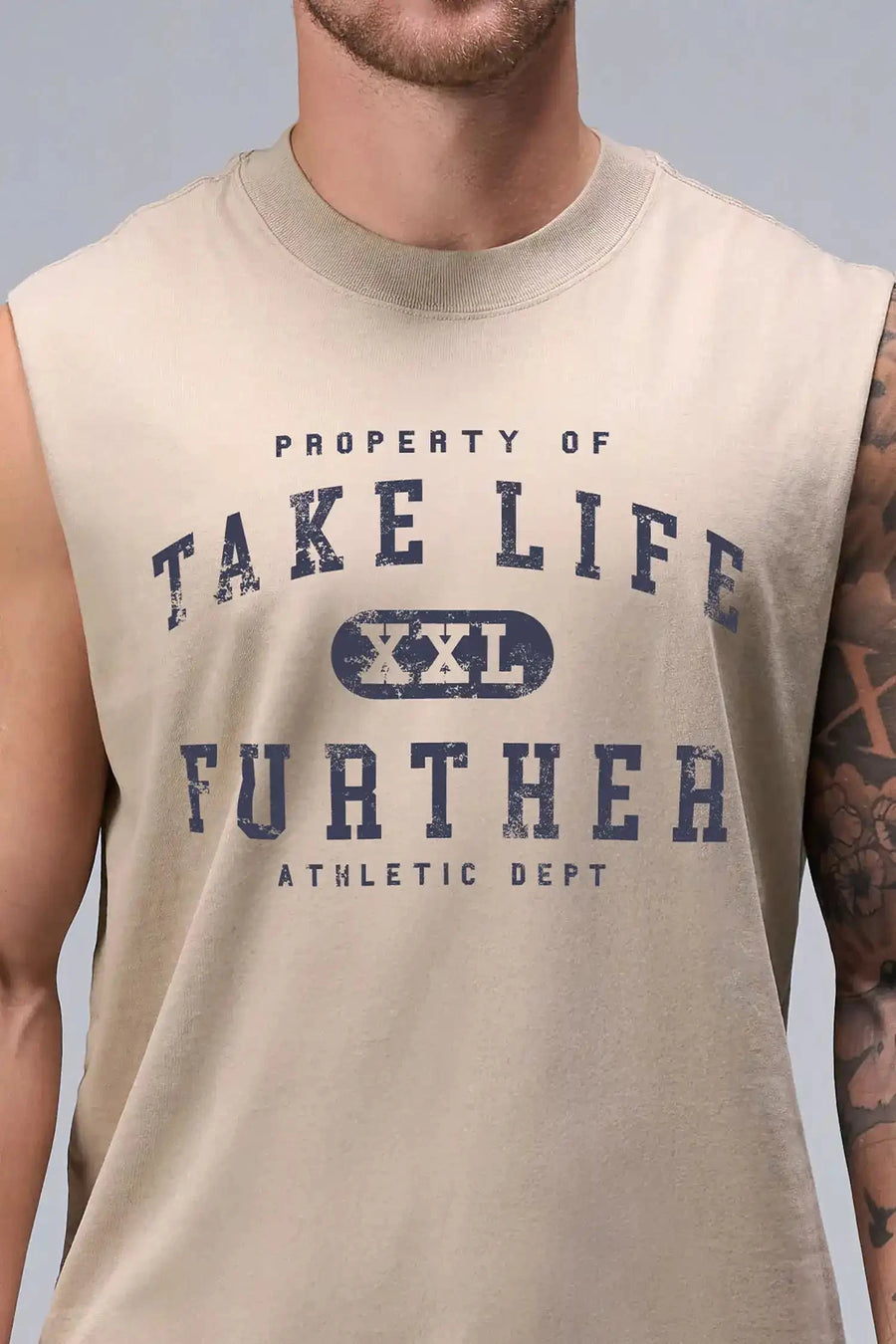 Front View of Tan TLF Property Of Heavy Cotton Muscle Tank featuring a distressed graphic design and raw edge arm holes. 
