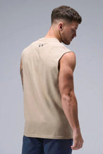 Back View of Tan TLF Property Of Heavy Cotton Muscle Tank featuring a distressed graphic design and raw edge arm holes. 