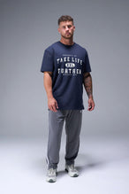 Front View of Blue TLF Property of Cotton Luxe Oversized Tee featuring a distressed graphic print design across the chest in our oversized t shirt fit