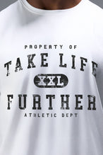 Detail Front View of White TLF Property of Cotton Luxe Oversized Tee featuring a distressed graphic print design across the chest in our oversized t shirt fit