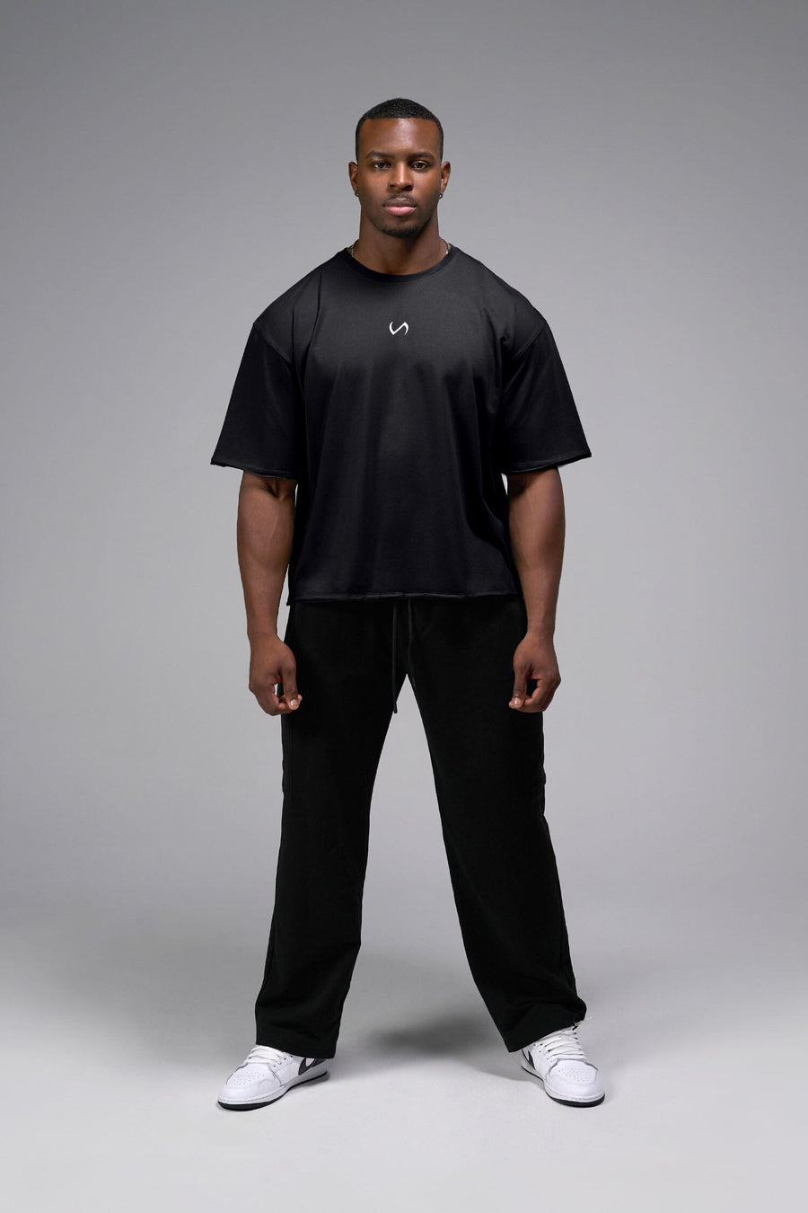 Front View Of Raw Edge Cropped Tee in Black