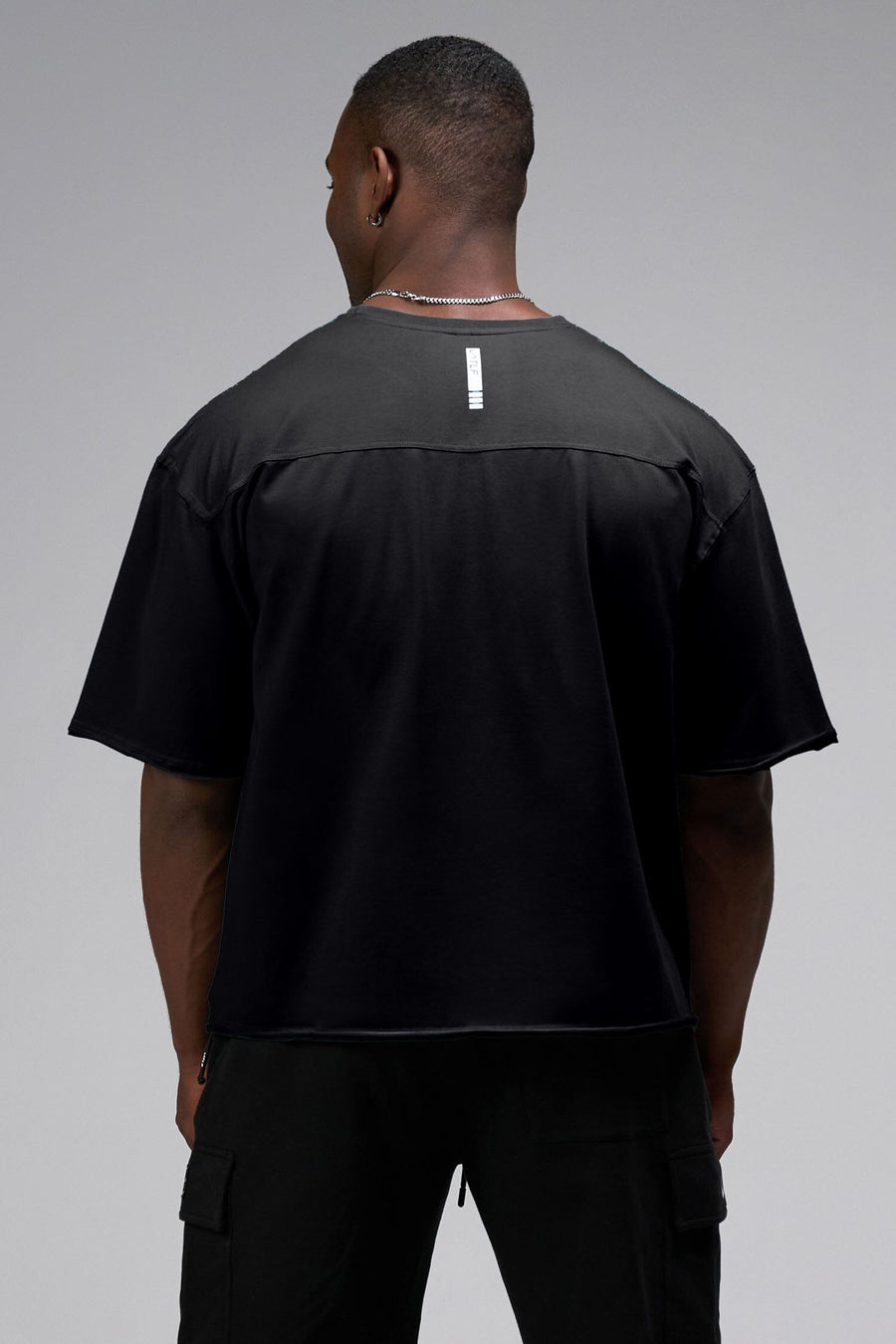 Back View Of Raw Edge Cropped Tee in Black