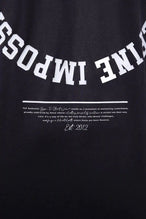 Back View of Black the TLF Redefine Original Cotton Luxe Oversized LS Tee that features a bold back graphic in an oversized fit. 