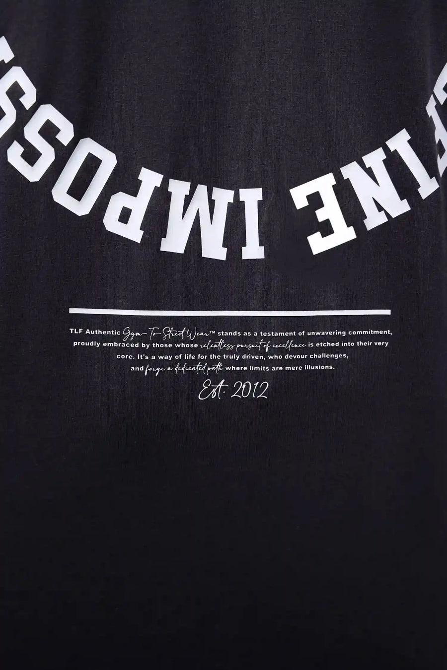 Back View of Black the TLF Redefine Original Cotton Luxe Oversized LS Tee that features a bold back graphic in an oversized fit. 