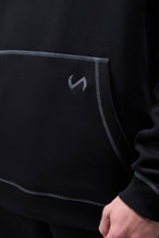 Detail Front View of Black TLF Scuba Tech Contrast Stitch Hoodie, featuring 3 panel hood, Kangaroo pockets and contrast stitching for streetwear aesthetic 