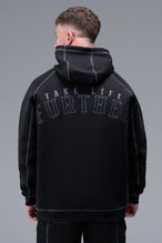 Back View of Black TLF Scuba Tech Contrast Stitch Hoodie, featuring 3 panel hood, Kangaroo pockets and contrast stitching for streetwear aesthetic 