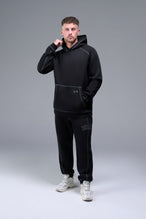 Front View of Black TLF Scuba Tech Contrast Stitch Hoodie, featuring 3 panel hood, Kangaroo pockets and contrast stitching for streetwear aesthetic 