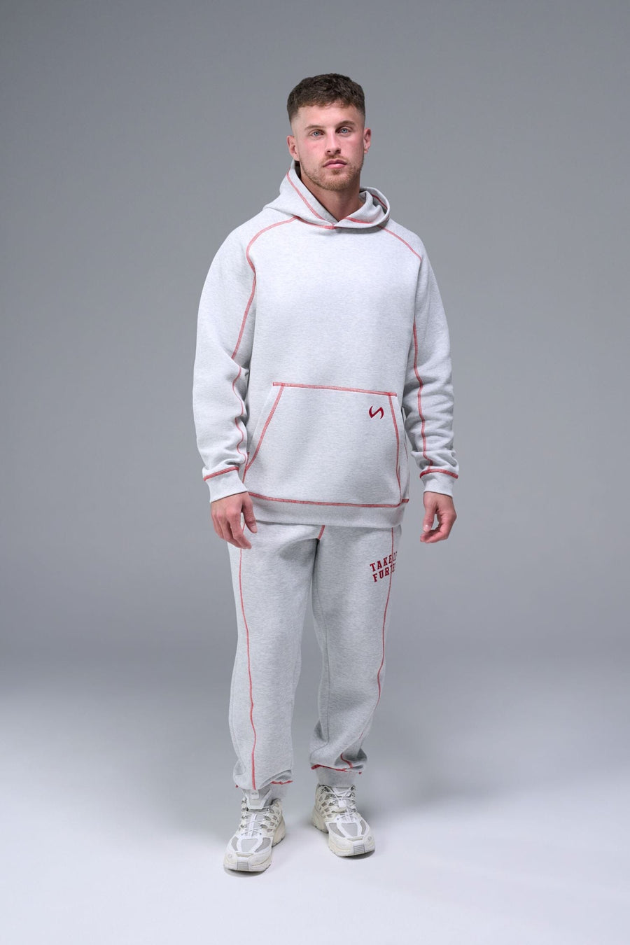 Detail Front View of Green TLF Scuba Tech Contrast Stitch Hoodie, featuring 3 panel hood, Kangaroo pockets and contrast stitching for streetwear aesthetic 
