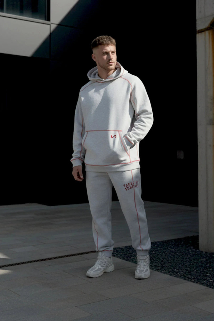 Front View of Gray TLF Scuba Tech Contrast Stitch Hoodie, featuring 3 panel hood, Kangaroo pockets and contrast stitching for streetwear aesthetic 