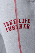 Detail Front View of Gray TLF Scuba Tech Contrast Stitch Joggers, featuring side zipper pockets and contrast stitching for streetwear aesthetic 