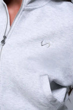 Front View of Gray TLF Scuba Tech Cropped Zip Up Jacket, featuring side zipper pockets, thumbholes and a cropped length 