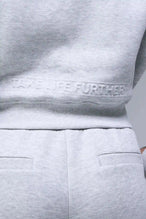 Back View of Gray TLF Scuba Tech Cropped Zip Up Jacket, featuring side zipper pockets, thumbholes and a cropped length 