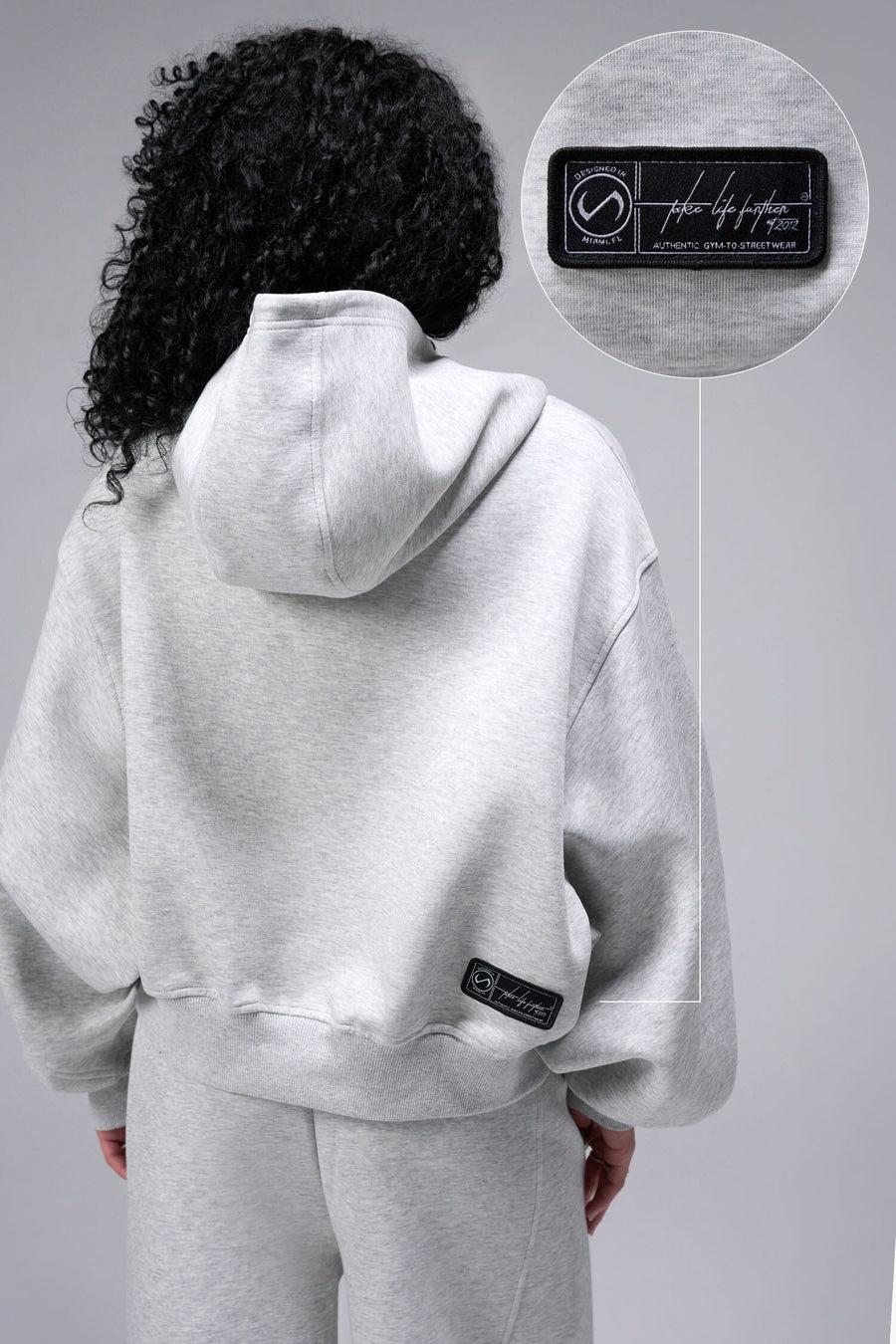 Back View Of Women's Scuba Tech Oversized Cropped Hoodie in Light Heather Gray