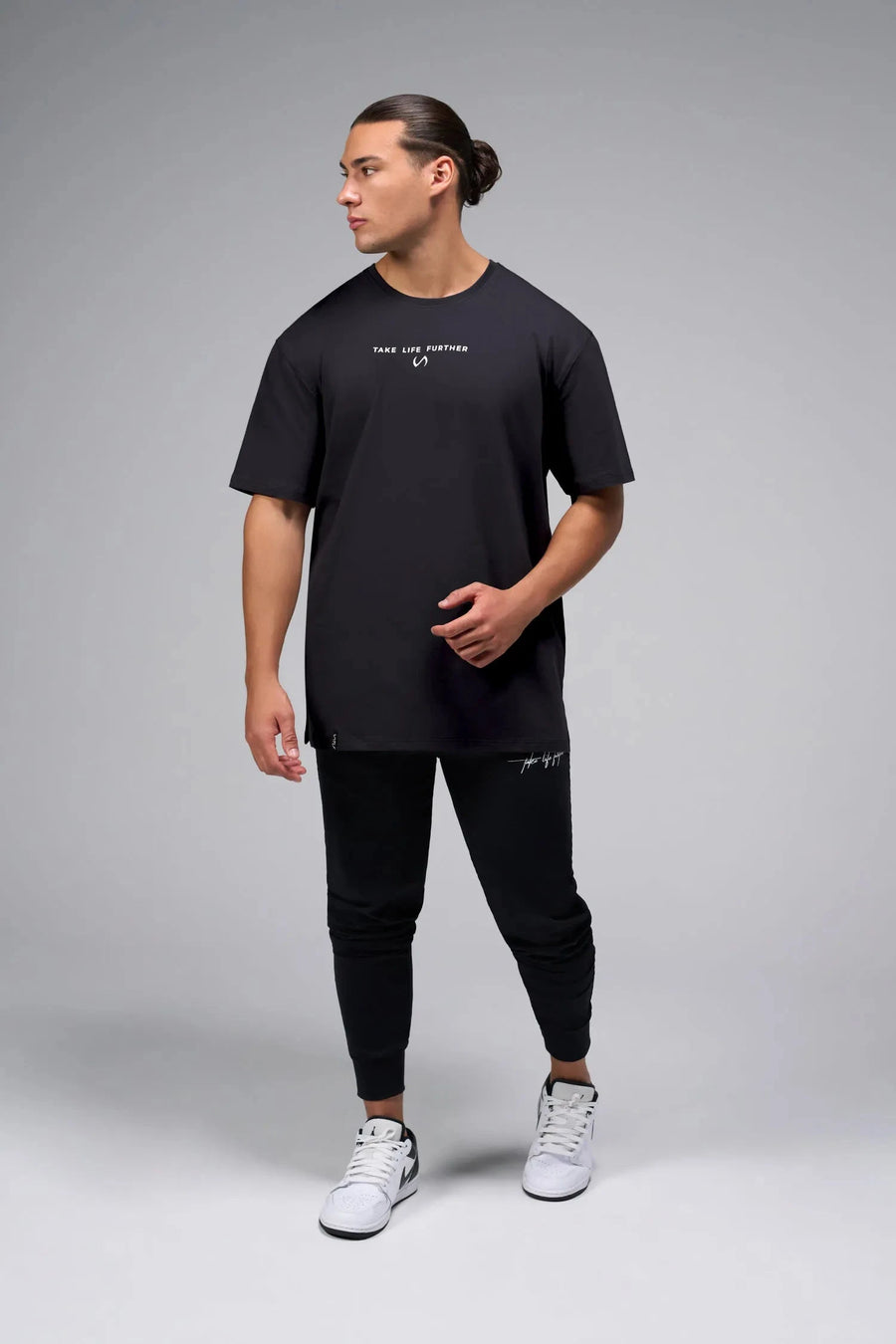 Back View Of Take Life Further Oversized Tee in Black