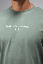 Front View View Of Take Life Further Oversized Tee in Green
