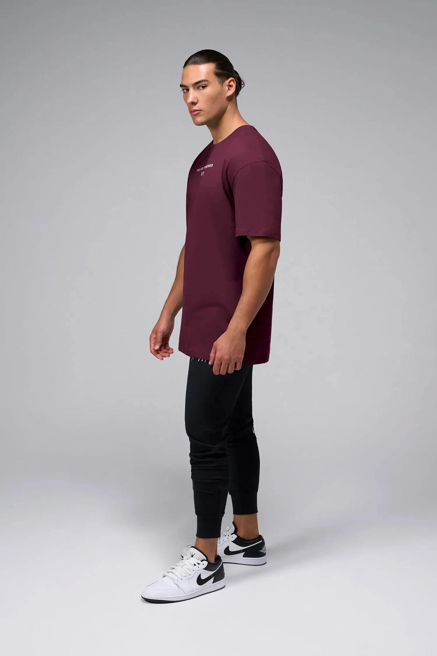 Side View Of Take Life Further Oversized Tee in Red