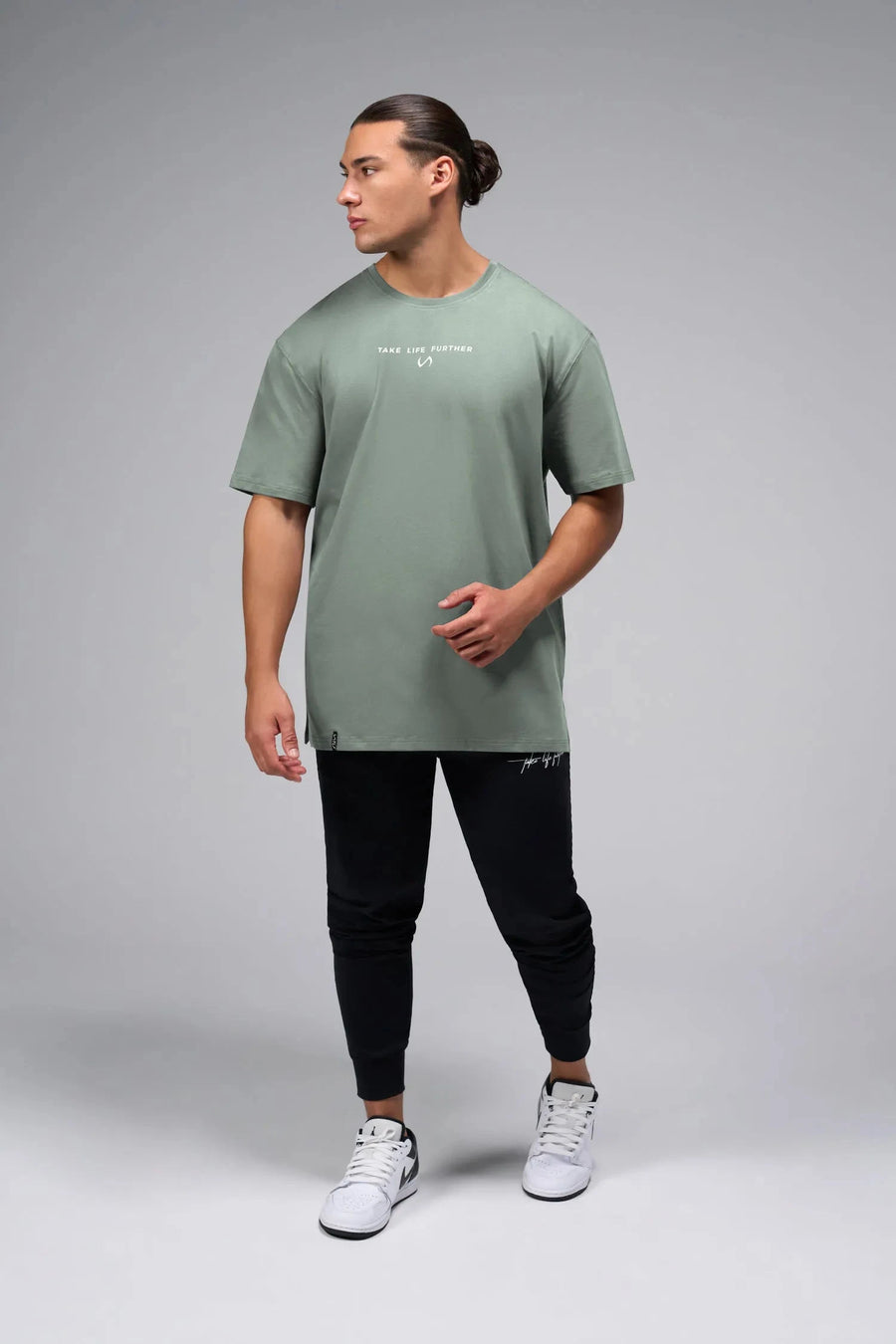 Front View Of Take Life Further Oversized Tee in Green