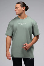 Front View Of Take Life Further Oversized Tee in Green
