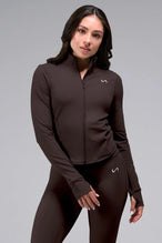 Front View of Brown TLF Tempo Cropped Zip Up Jacket featuring thumbholes and cropped length for gym and lifestyle wear 
