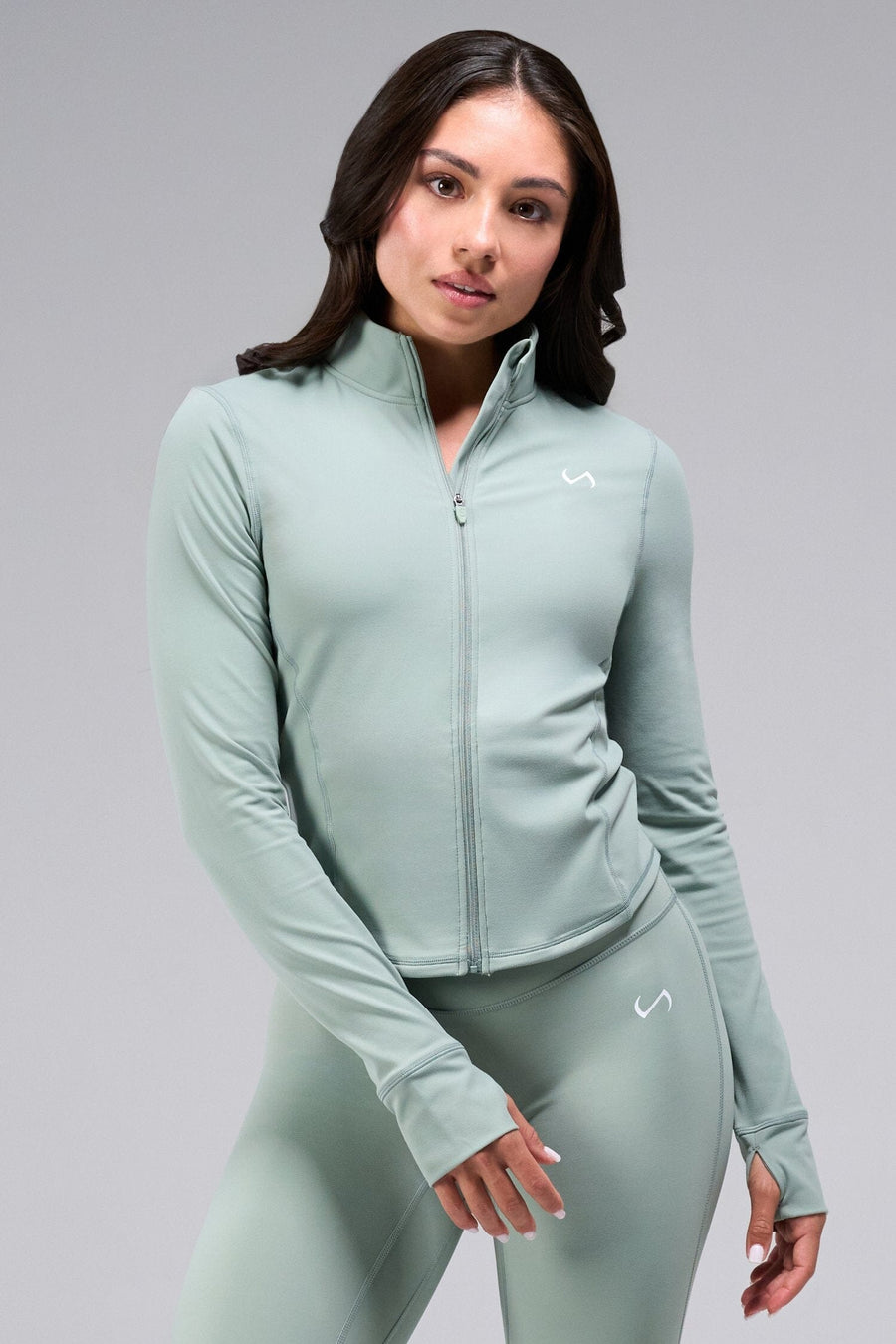Front View Of Women's Tempo Cropped Zip Up Jacket in Sage Green
