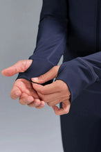 Detail  View of Blue TLF Tempo Cropped Zip Up Jacket featuring thumbholes and cropped length for gym and lifestyle wear 