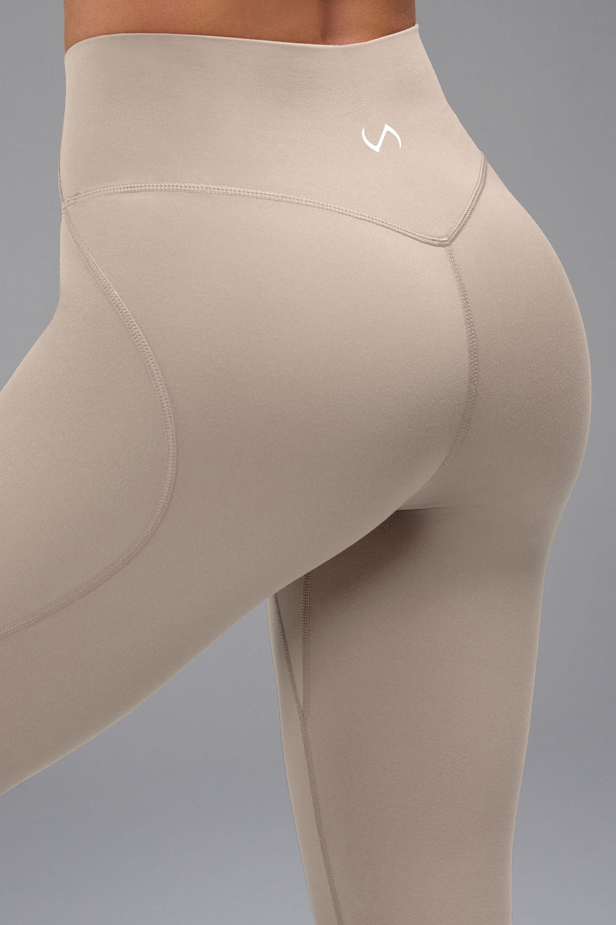 Detail Front View of Tempo Flare Leggings in Taupe Color