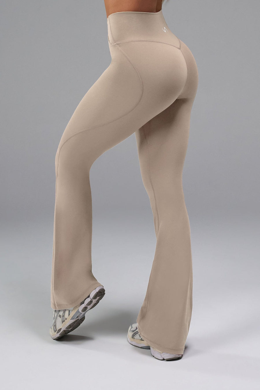 Side View of Tempo Flare Leggings in Taupe Color