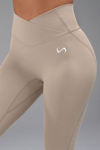 Side View of Tempo Flare Leggings in Taupe Color