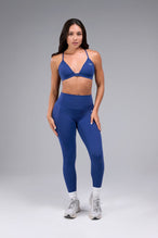 Front View of Oxford Blue TLF Tempo Front Clasp Sports Bra 2.0 with a strappy back and front closure, designed for style and support 