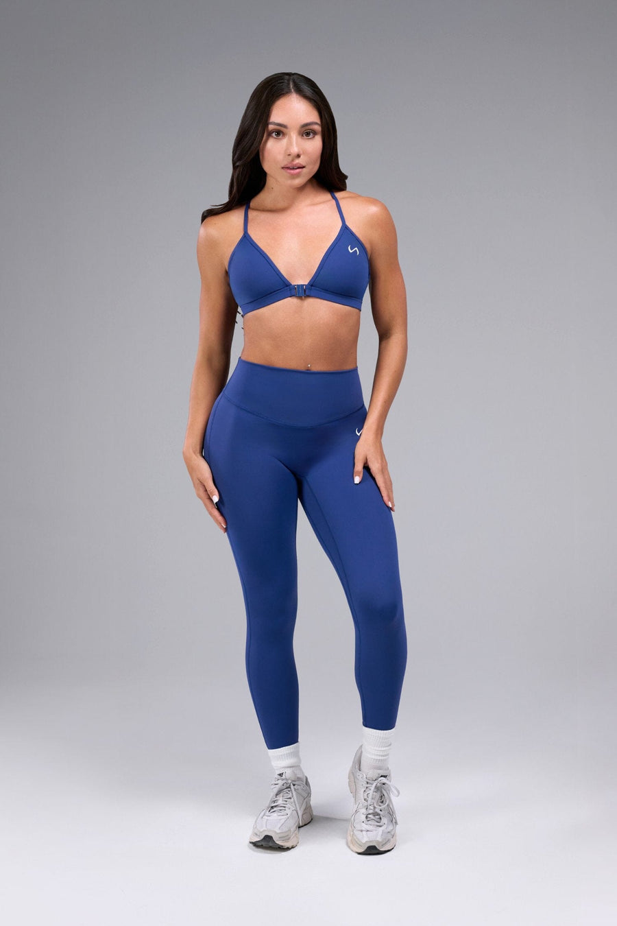 Front View of Oxford Blue TLF Tempo Front Clasp Sports Bra 2.0 with a strappy back and front closure, designed for style and support 
