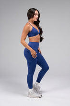 Side View of Oxford Blue TLF Tempo Front Clasp Sports Bra 2.0 with a strappy back and front closure, designed for style and support 