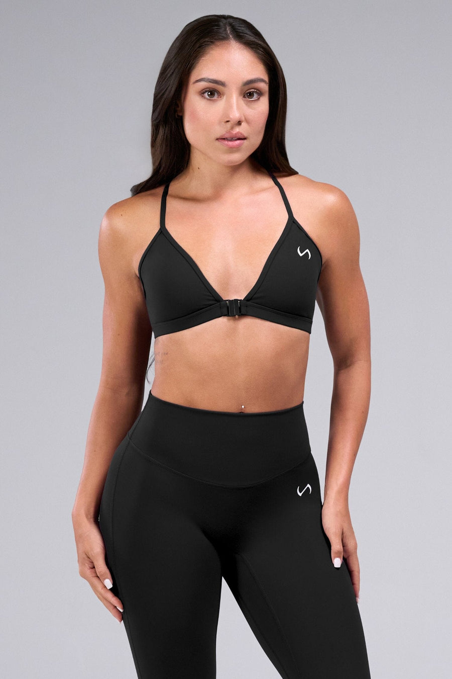Front View of Black TLF Tempo Front Clasp Sports Bra 2.0 with a strappy back and front closure, designed for style and support 