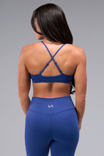 Back View of Oxford Blue TLF Tempo Front Clasp Sports Bra 2.0 with a strappy back and front closure, designed for style and support 