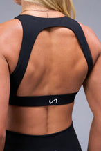 Back View of Black TLF Tempo High Neck Sports Bra, featuring a high neckline for high impact support during workouts, cardio and all day wear 