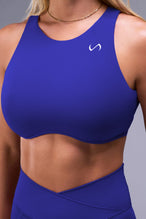 Front View of Blue TLF Tempo High Neck Sports Bra, featuring a high neckline for high impact support during workouts, cardio and all day wear 