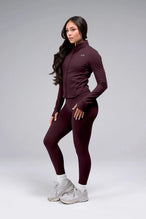 Side View Of Tempo High Waisted Workout Leggings in Wine